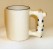 Kindertasse mit &quot;Kuh&quot; als Grifform